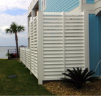8ft high Louvers covering equipment, steps down to 4ft high, 2x6 inch uprights with 0.75in gap
